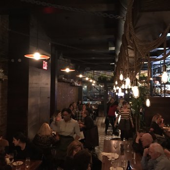 Boutros - Beautiful open decor with Edison bulbs hanging by single strings - New American Near Me - Brooklyn, New York