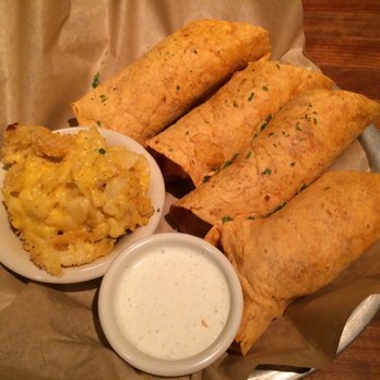 Cheddar's Scratch Kitchen - Buffalo chicken wrapper with Mac and cheese. So much food for $8.49! - American Near Me - Austin, Texas