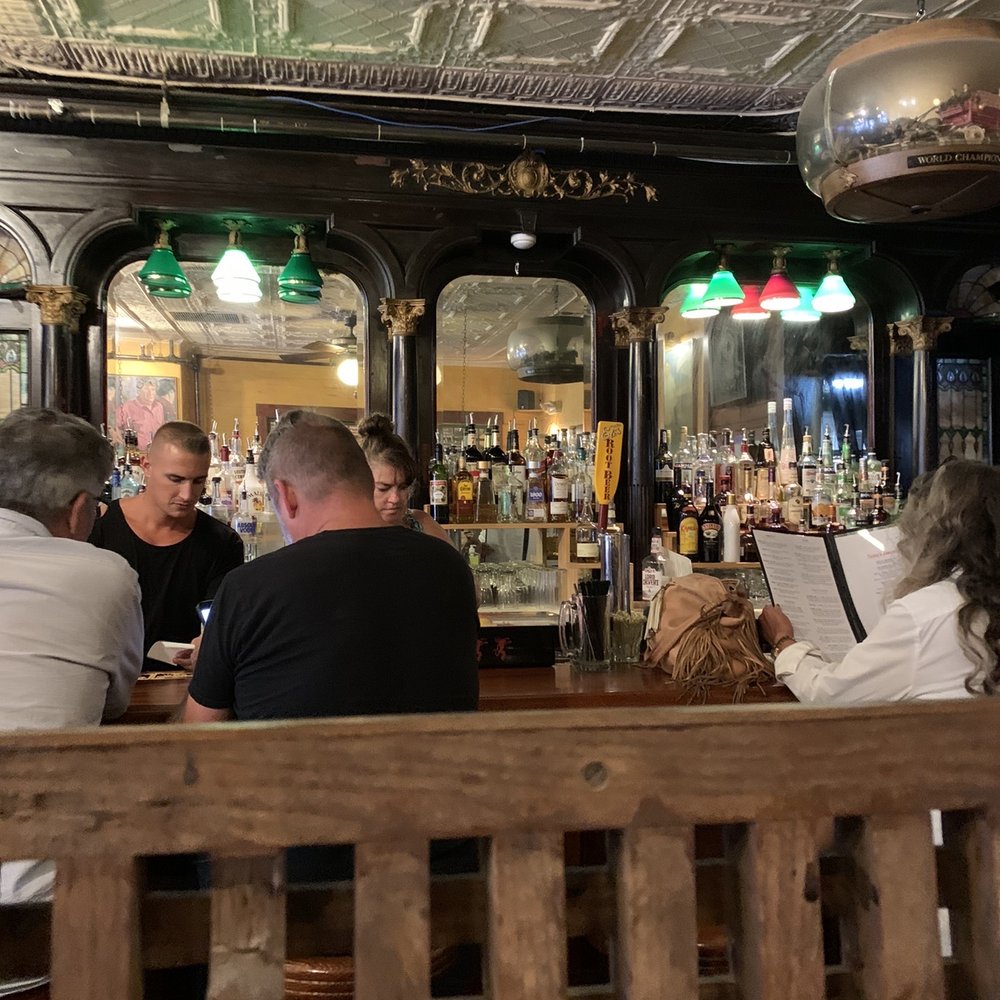people sitting at the bar