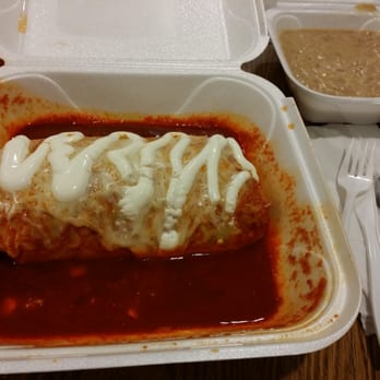 Los Huaraches - Suizo burrito with red sauce and side of beans to go - Mexican Near Me - Northbrook, Illinois