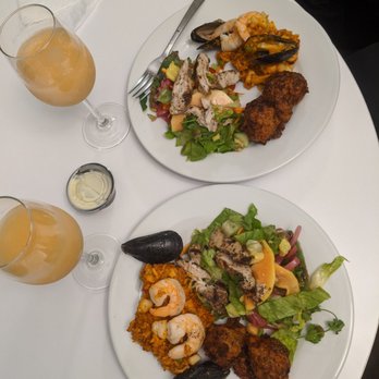 Kaya - Self plated conch fritters, rainbow salad, and tropical paella - Caribbean Near Me - Pittsburgh, Pennsylvania Kaya - Self plated conch fritters, rainbow salad, and tropical paella - Caribbean Near Me - Pittsburgh, Pennsylvania