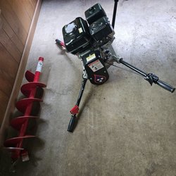 Southern Restoration and Rental - "Auggie" the auger. One forward gear, three kill switches, and digs holes 25x faster than me with a shovel.