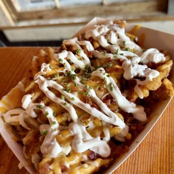 The Village Bar - Waffle fry nachos - Bars Near Me - Saint Louis, Missouri