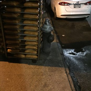 Mazzola Bakery - Look at the bread, hydrant, car, and puddle--is this appetizing? - Bakeries Near Me - Brooklyn, New York Mazzola Bakery - Look at the bread, hydrant, car, and puddle--is this appetizing? - Bakeries Near Me - Brooklyn, New York