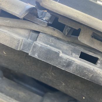 Showcase Auto Glass - Not put back together, crushing wiper hose. - Auto Glass Services Near Me - Highland, California Showcase Auto Glass - Not put back together, crushing wiper hose. - Auto Glass Services Near Me - Highland, California