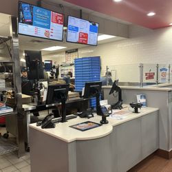 Domino's Pizza - Menu and working station