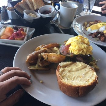 Ama Ama Restaurant - Breakfast Bacon sandwich with avocado side paired with Aulani potatoes. - New American Near Me - Kapolei, Hawaii Ama Ama Restaurant - Breakfast Bacon sandwich with avocado side paired with Aulani potatoes. - New American Near Me - Kapolei, Hawaii