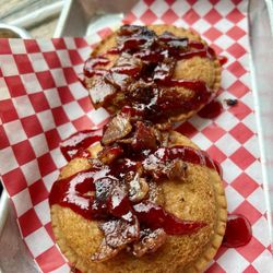 Playmakers Sports Bar + Grill - Deep fried uncrustables with bacon!!  A MUST TRY!! It's the best darn thing I've had that's sweet!!