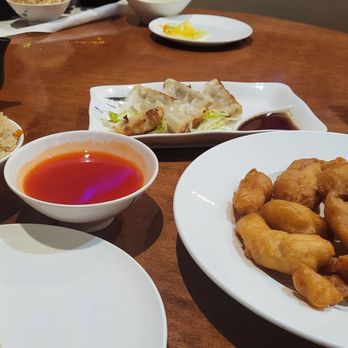 Kumo Asian Bistro - Sweet and sour chicken with sauce on the side. Fried rice in the background. - Japanese Near Me - Alexandria, Virginia