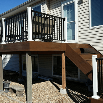 Green's Home Improvement - a deck and stairs - Decks & Railing Near Me