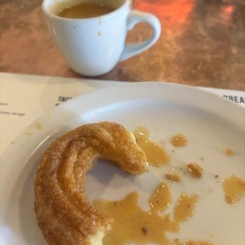 Amerikas - Half of a heart-shaped churro with dulce con Leche - Latin American Near Me - Oak Park, Illinois