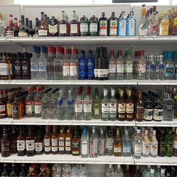 Shell - a shelf of alcohol bottles in a liquor store - Gas Stations Near Me - Hamilton, Ontario