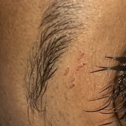 SOI Brow Threading-Inwood - DO NOT LET PRAPTI DO YOUR BROWS! SCABS EVERYWHERE! I don't even grow hair in that area!