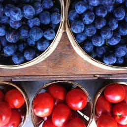 Plums and tomatoes fresh from the orchard.