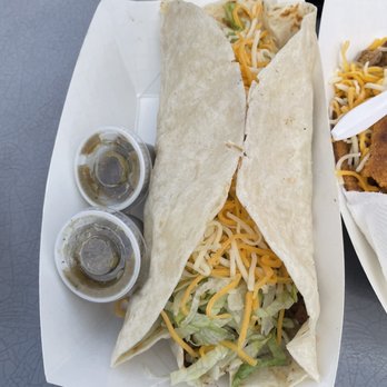 Tony's Tacos - two burritos on a table - Mexican Near Me - Standish, Michigan Tony's Tacos - two burritos on a table - Mexican Near Me - Standish, Michigan