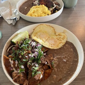 Casa Mia - Chilaquiles, one with mole and the other with birria from the specials menu - Breakfast & Brunch Near Me - Mountain View, California Casa Mia - Chilaquiles, one with mole and the other with birria from the specials menu - Breakfast & Brunch Near Me - Mountain View, California