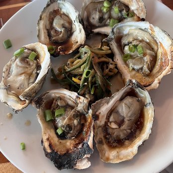 Island Grille - Chargrilled oysters with a ginger soy glaze. - American Near Me - Atlantic Beach, North Carolina Island Grille - Chargrilled oysters with a ginger soy glaze. - American Near Me - Atlantic Beach, North Carolina