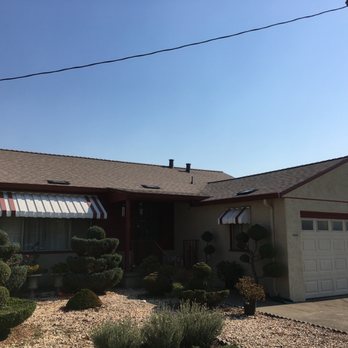 Wonderlin Roofing Systems - After: completed new roof; attic is vented by O'Hagen vent (intake) and ridge vent (exhaust) - Roofing Near Me - Hayward, California Wonderlin Roofing Systems - After: completed new roof; attic is vented by O'Hagen vent (intake) and ridge vent (exhaust) - Roofing Near Me - Hayward, California