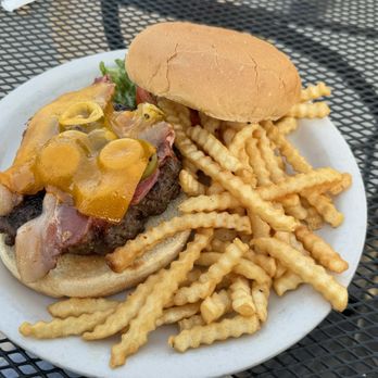 The Cove Restaurant And Bar - Cove burger - bacon, jalapenos, cheddar cheese (I asked for the fried onion straws on the side - not pictured) - New American Near Me - Boonville, Missouri The Cove Restaurant And Bar - Cove burger - bacon, jalapenos, cheddar cheese (I asked for the fried onion straws on the side - not pictured) - New American Near Me - Boonville, Missouri