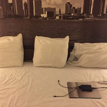 Super 8 by Wyndham Belleville - The pillows are tiny and cheap - you'll need all three for adequate support. - Hotels Near Me - Belleville, Michigan