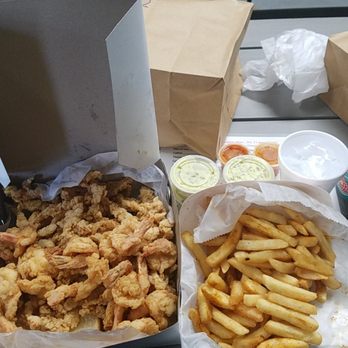 Kevin's Seafood - Box of fried shrimp and fried clam strips. Side if seasoned fries. - Seafood Near Me - New Haven, Connecticut Kevin's Seafood - Box of fried shrimp and fried clam strips. Side if seasoned fries. - Seafood Near Me - New Haven, Connecticut