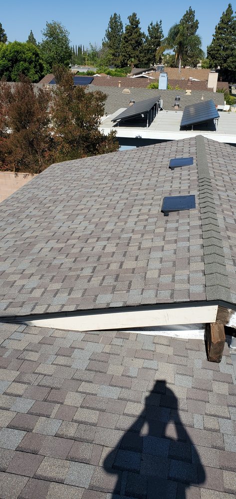 Slide of Three Clovers Roofing