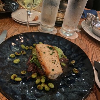 Euphoria Fish House - Chilean sea bass with bok Choy and edamame. $36 I added two sides for another $12 to actually feel full. - New American Near Me - Kissimmee, Florida Euphoria Fish House - Chilean sea bass with bok Choy and edamame. $36 I added two sides for another $12 to actually feel full. - New American Near Me - Kissimmee, Florida