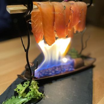 Izakaya Nana - Smoke Salmon on the Fire (video opp. - salmon is light on fire at the table) - Izakaya Near Me - Queens, New York Izakaya Nana - Smoke Salmon on the Fire (video opp. - salmon is light on fire at the table) - Izakaya Near Me - Queens, New York
