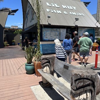Lil Hut - Outside the Lil hut. Benches. - Seafood Near Me - Morro Bay, California