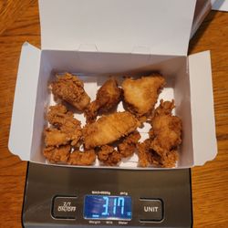 KFC - Had the scale on the table for something else. Wow these nugs are trash.