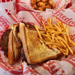 Freddy's Frozen Custard & Steakburgers - Grilled cheese burger and fries