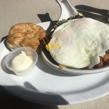 Wild Eggs - Farmer's Market Skillet with over easy eggs and biscuit as side - Breakfast & Brunch Near Me - Lexington, Kentucky Wild Eggs - Farmer's Market Skillet with over easy eggs and biscuit as side - Breakfast & Brunch Near Me - Lexington, Kentucky