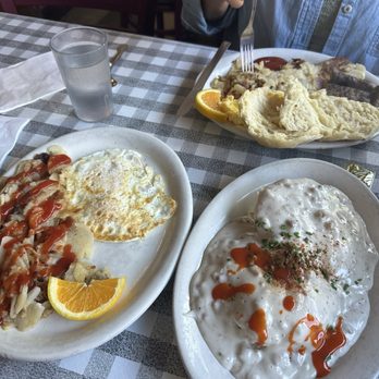 Stepping Stone Cafe - Classic sausage two egg breakfast in the back and biscuits and gravy. - American Near Me - Portland, Oregon Stepping Stone Cafe - Classic sausage two egg breakfast in the back and biscuits and gravy. - American Near Me - Portland, Oregon