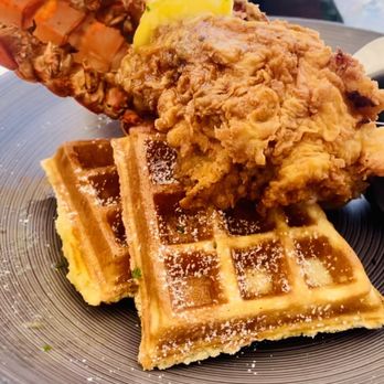 Peche Modern Coastal - Lobster and waffles  IG: Dish_n_it - Seafood Near Me - Peachtree Corners, Georgia