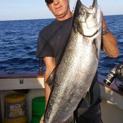 Captain john with a nice king salmon .