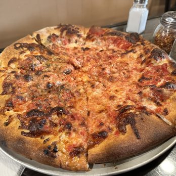 Santarpio's Pizza - All pizzas the same size. This is pepperoni add garlic to half - Pizza Near Me - Boston, Massachusetts Santarpio's Pizza - All pizzas the same size. This is pepperoni add garlic to half - Pizza Near Me - Boston, Massachusetts
