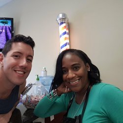 A Prestige Barber Shop - Me with a new haircut and Angela.