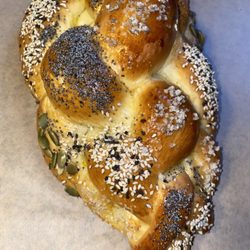 Classic challah bread top with seeds