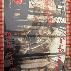 Chez Roger Hassenforder - As for the ambience-- here is the paper placemat. It's cheeky and welcoming. Many mounted deer and boar heads.
