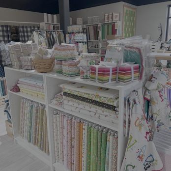 Quilters Bliss - Display view of current fabrics on display. - Fabric Stores Near Me - Olathe, Kansas Quilters Bliss - Display view of current fabrics on display. - Fabric Stores Near Me - Olathe, Kansas