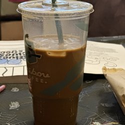 Caribou Coffee - Turtle Mocha XL . Took out some of the ice and this is what was left without taking a drink first " YIKES " . Talk about what a ripoff .