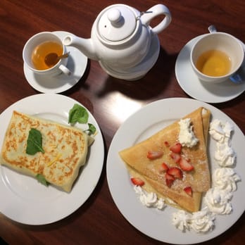 Piroshky & Crepes - Cottage cheese with strawberry crepe and polish sausage spinach cheese crepe. Earl grey tea ^^ yum! - Bakeries Near Me - Everett, Washington