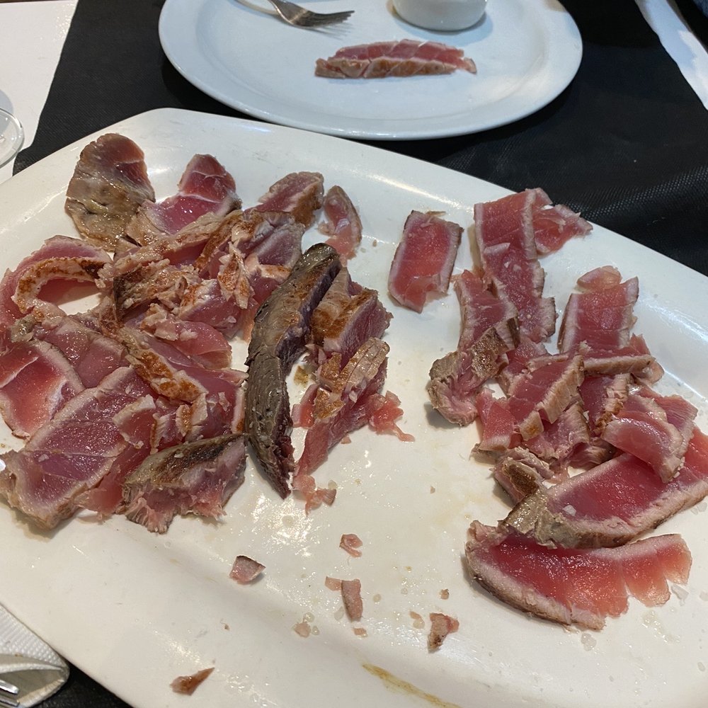 Meson Rincon De Rodri - Rare tuna steak...perfectly cooked and sliced at our table for us by the waiter - Seafood Near Me - Granada, GR Meson Rincon De Rodri - Rare tuna steak...perfectly cooked and sliced at our table for us by the waiter - Seafood Near Me - Granada, GR