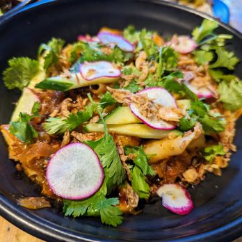 M Kokko - Biang Biang Noodle. $15. Smoked tofu, yu choy, cilantro, crispy shallots, pickled mustard, black vinegar, and chili oil. - Korean Near Me - Durham, North Carolina