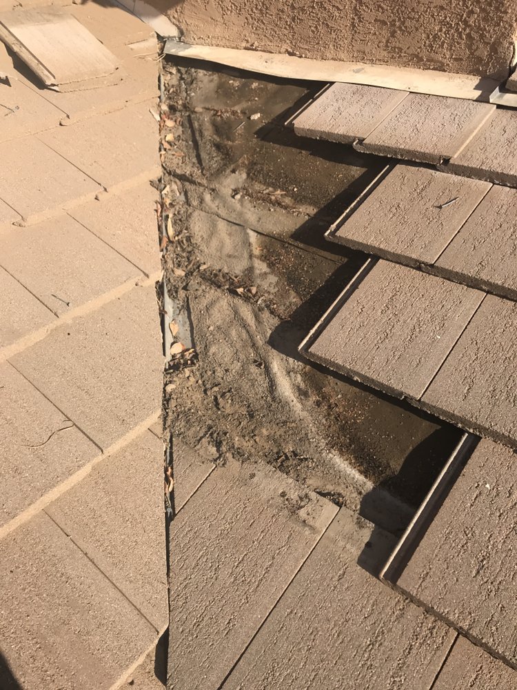 Slide of The Roof Repair Guy