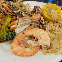 Boiled shrimp, fried rice, crab, corn, and broccoli with chicken.