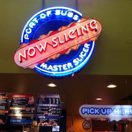 a neon sign for a fast food restaurant