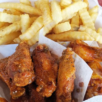 Touchdown Wings - Spicy Garlic Butter wings and fries with seasoned salt. - Chicken Wings Near Me - Lawrenceville, Georgia Touchdown Wings - Spicy Garlic Butter wings and fries with seasoned salt. - Chicken Wings Near Me - Lawrenceville, Georgia
