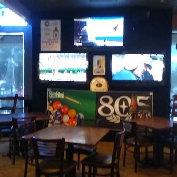 Slate Street Billards - I side there is plenty of tables where you can enjoy beverages and food. - Pool Halls Near Me - Rio Rancho, New Mexico