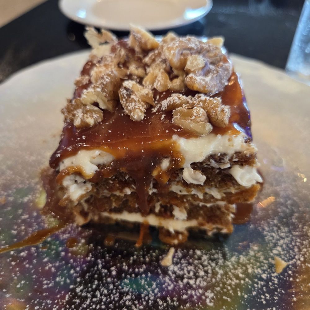 Ardiana’s Restaurant - Carrort cake- the portion is big (even though at this angle it doesn't look like it). Had to take at least half home. - American Near Me - Novi, Michigan